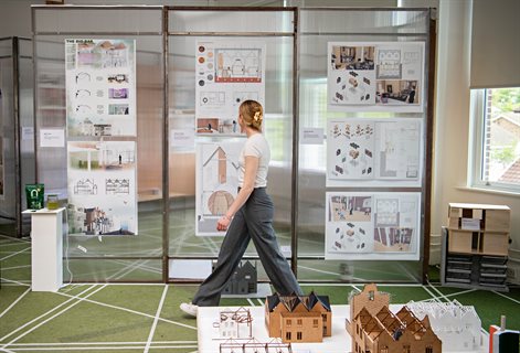 Person walking past interior architecture final year show