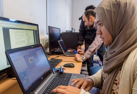 Female student working in the cyber security lab