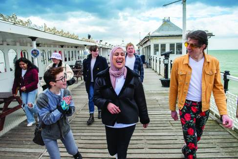Students walking down Brighton Pier