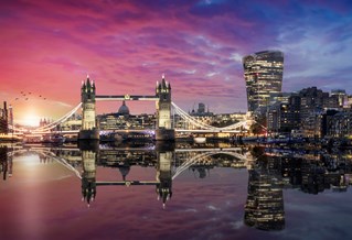 London economic district of City of London and London Bridge at sunset