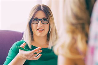 Counsellor working with a client