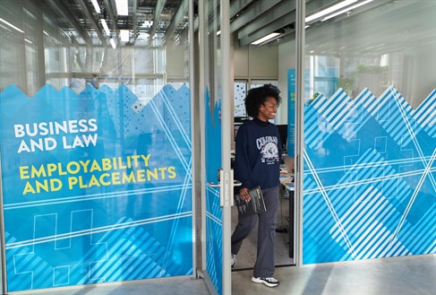 Student leaving the business and law employability office
