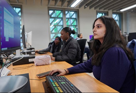 female student using Bloomberg suite