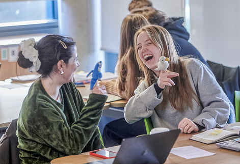 teaching students laughing