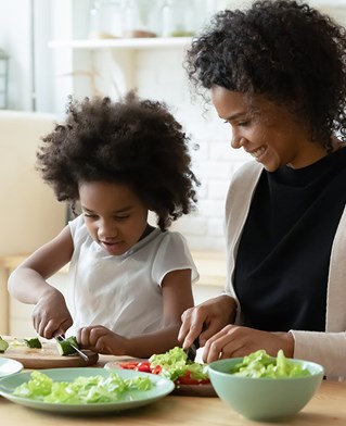 mum and daughter cooking