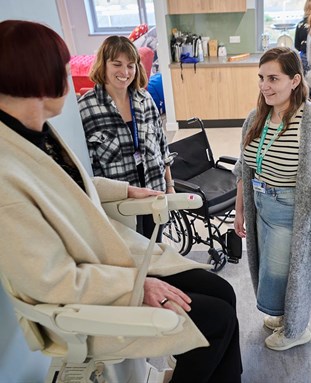 student using the stairlift in our occupational therapy suite