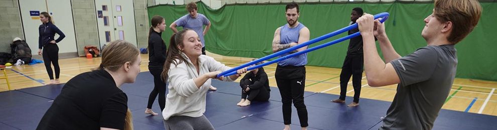 students exercising in the sports hall