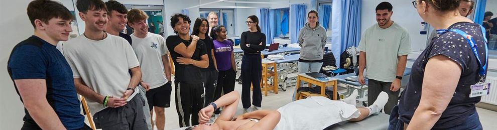 group of students being shown physio skills