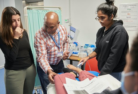 Physio students with lecturer