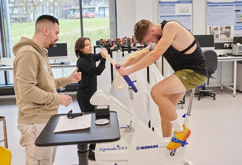 student doing testing on a bike