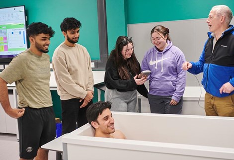 student in a bath