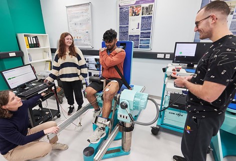 students using equipment in the labs