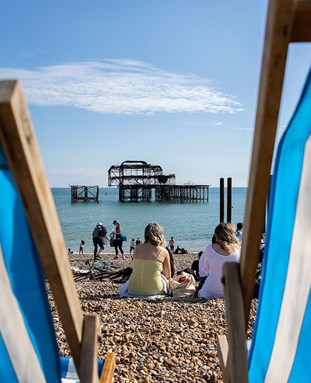 Brighton Beach deck chairs and the West Pier