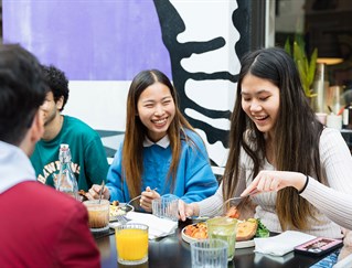 Kaplan Students in Brighton enjoying a meal together