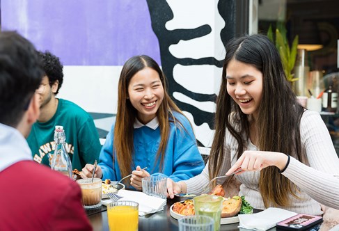 Kaplan Students in Brighton enjoying a meal together