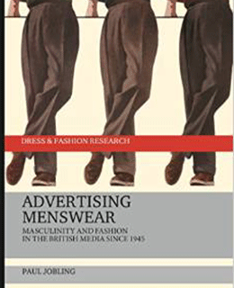 Advertising menswear book cover: three sets of men's legs in brown trousers and shoes