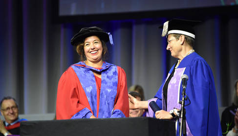 Dame Marianne Griffiths receiving her Honorary Doctor of Science from Professor Debra Humphris