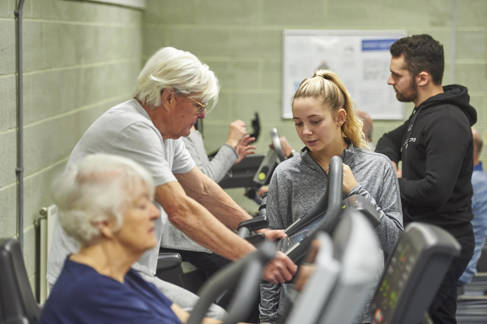 Students working with cardiac rehab clients