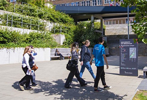 Students walking by the University of Brighton Moulsecoomb campus