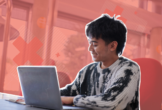 A student working on a laptop